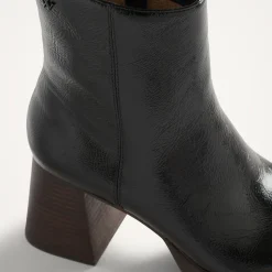 Bottines noires à plateforme et talon bois