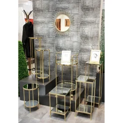 Desserte en métal laitonné et tablettes en verre miroir