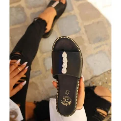 Mules plates détails strass femme cuir noire