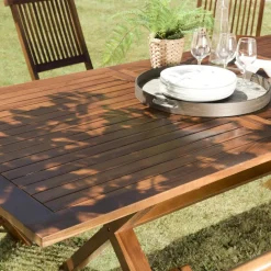 Salon de jardin HANNA en bois teck huilé 8/10 personnes - ensemble de jardin : 1 table rectangulaire pieds croisés extensible 180*240/100 cm et 6 chaises.
