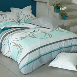 Taie d'oreiller ou traversin motif spirales - vert d'eau